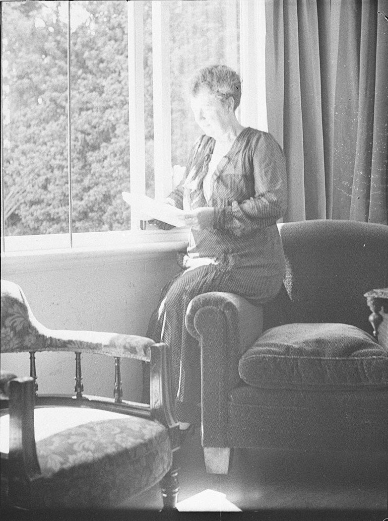 Mrs James Ashton Senior reading at a window (c. 1935)