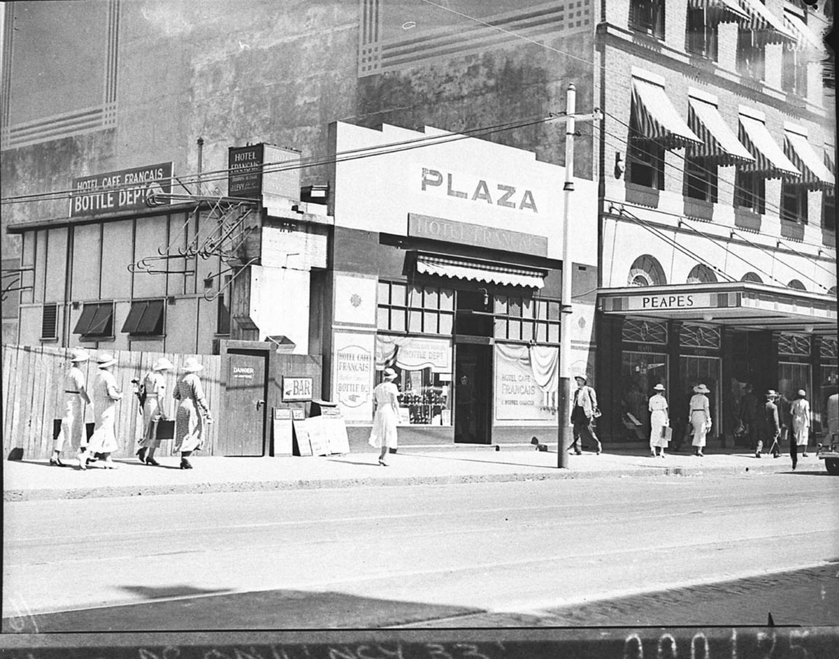 Plaza Hotel temporary bar and Peapes Menswear Store next door (1935)