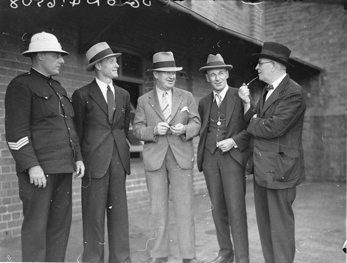 Police sergeant and four plainclothed detectives (1930s)