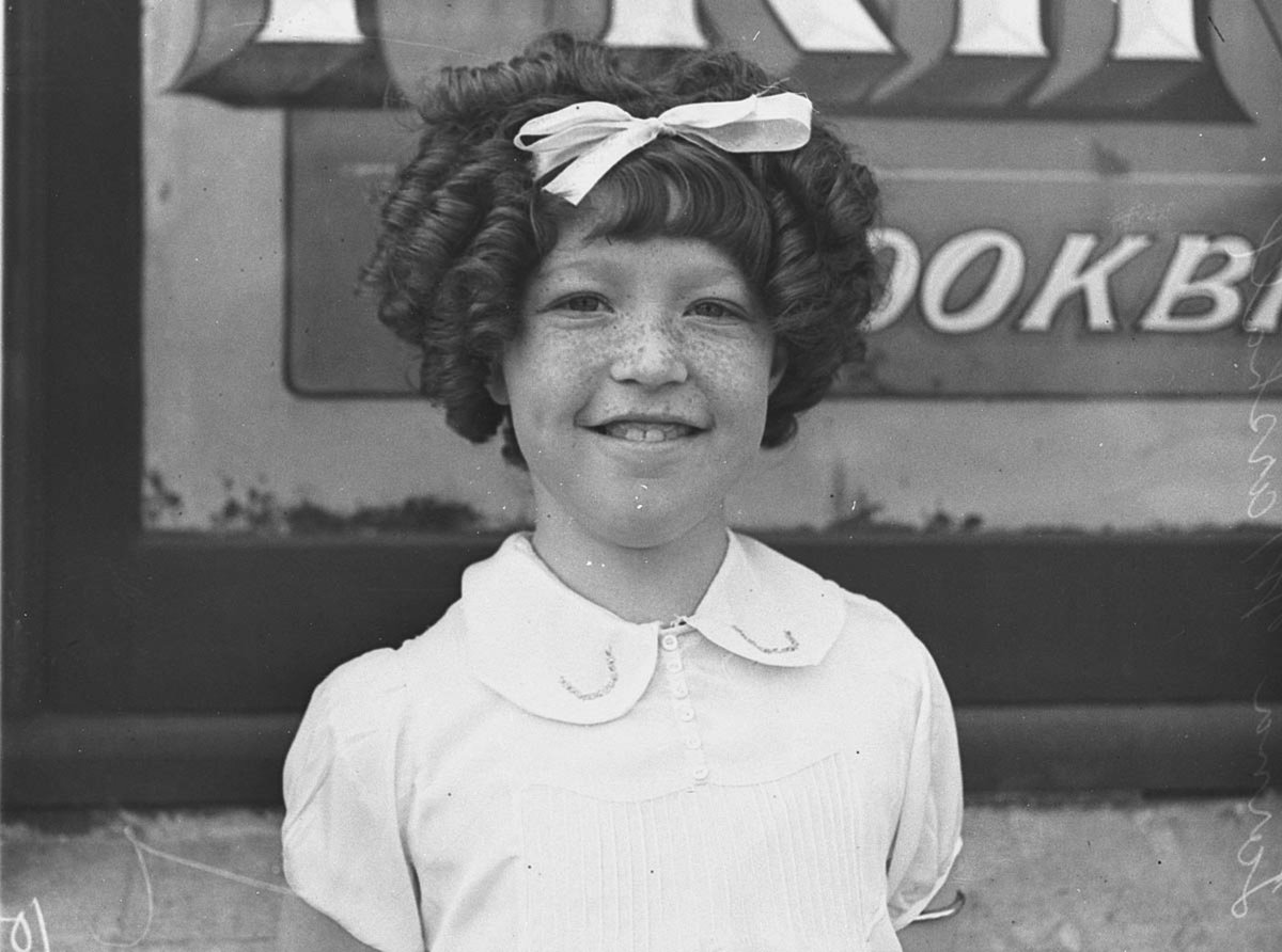 Portrait of frecklefaced girl Lorna Marshall at Campsie Baby Show (1934)