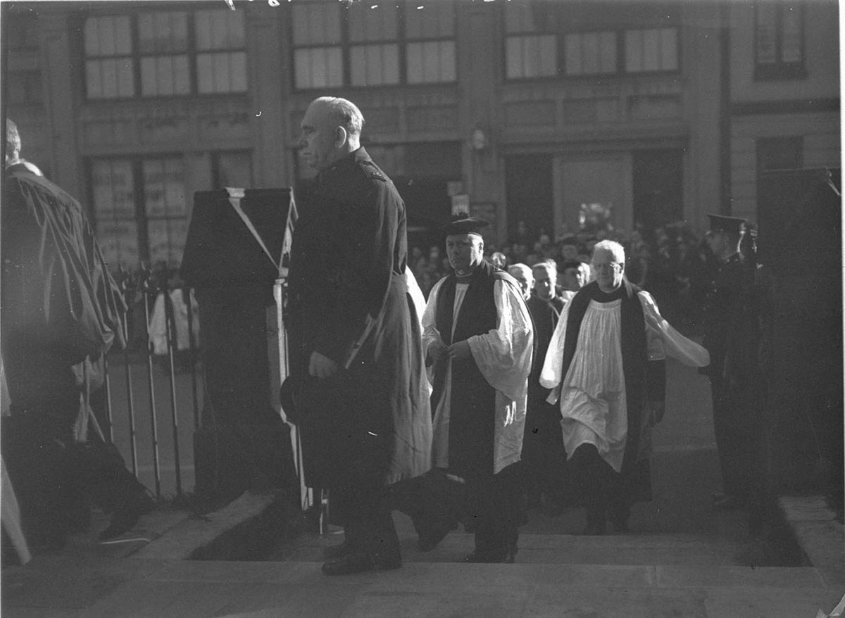 Procession of clergy at rear of St Andrews Cathedral, Sydney city centre (1930s)