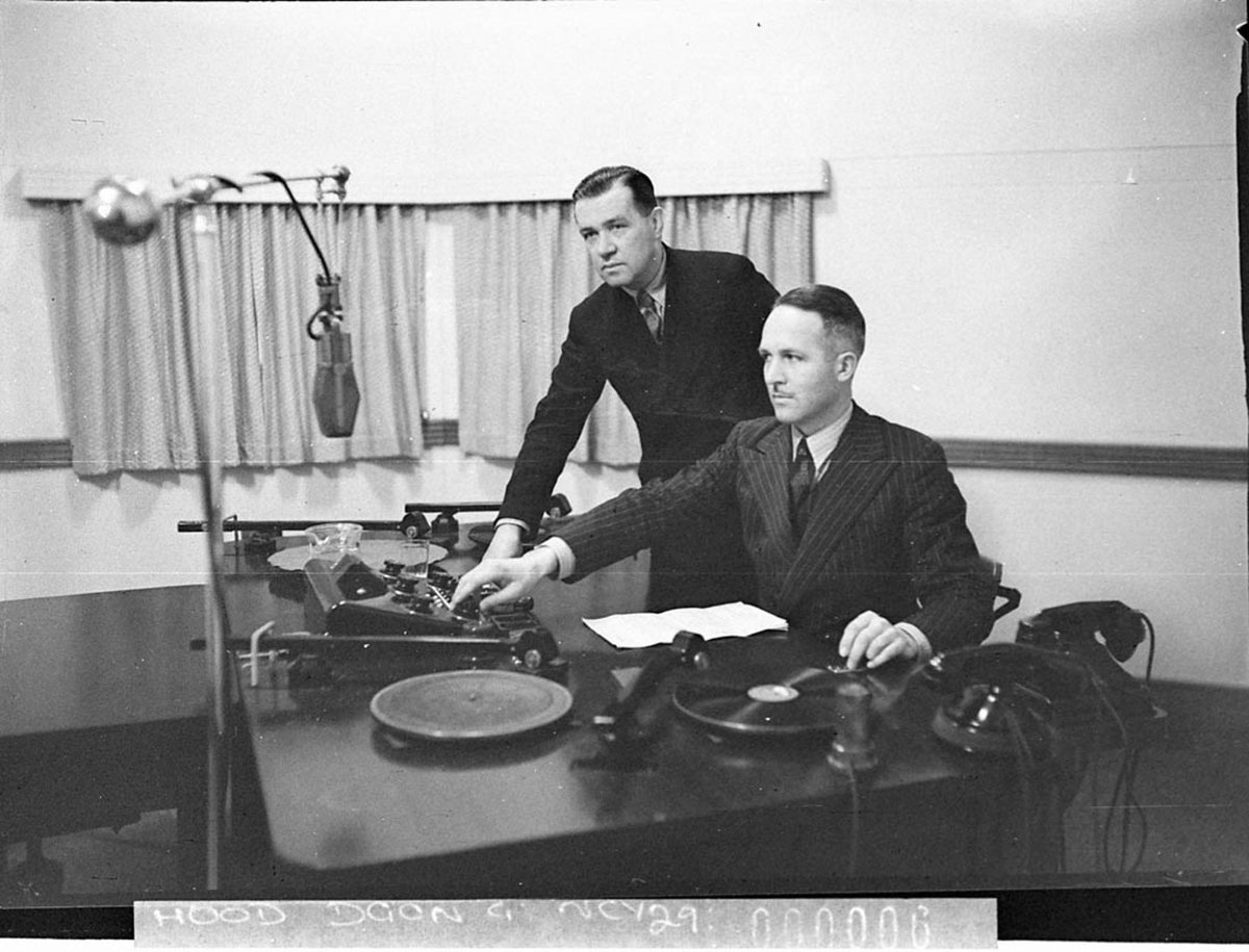 Radio station 2GZ Two men operating the panel and turntable (1937)