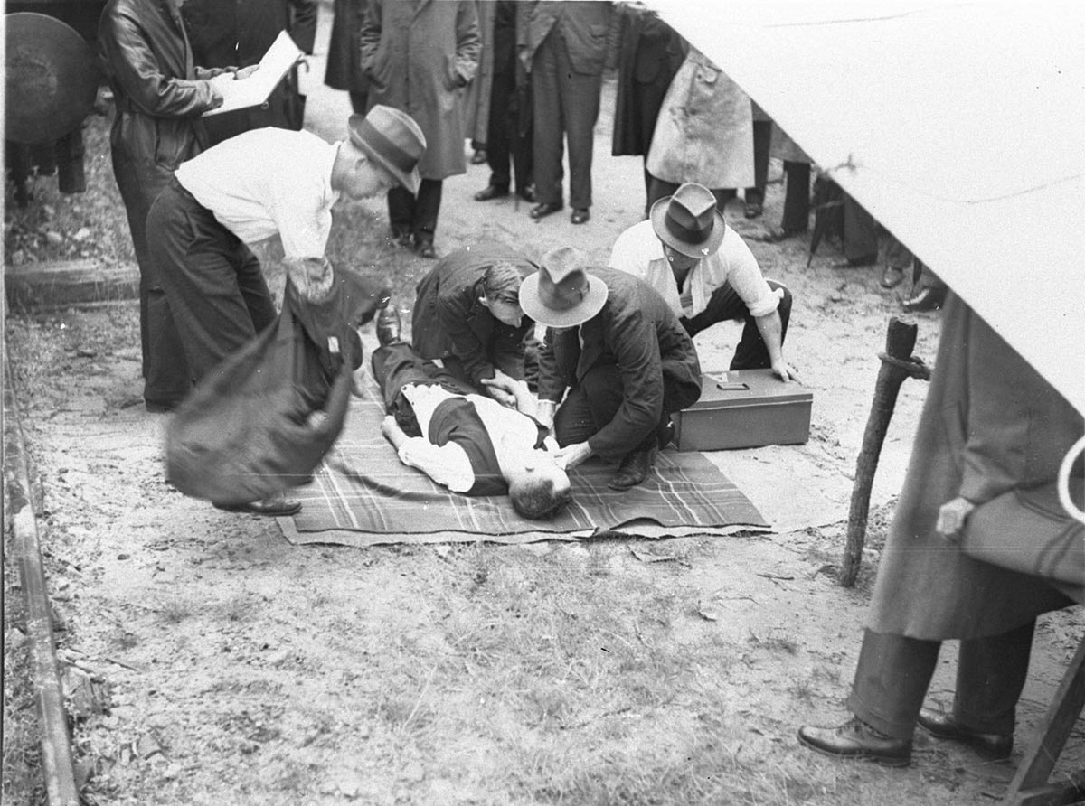 Railway rescue team working on a patient Railway Ambulance competition (1934)
