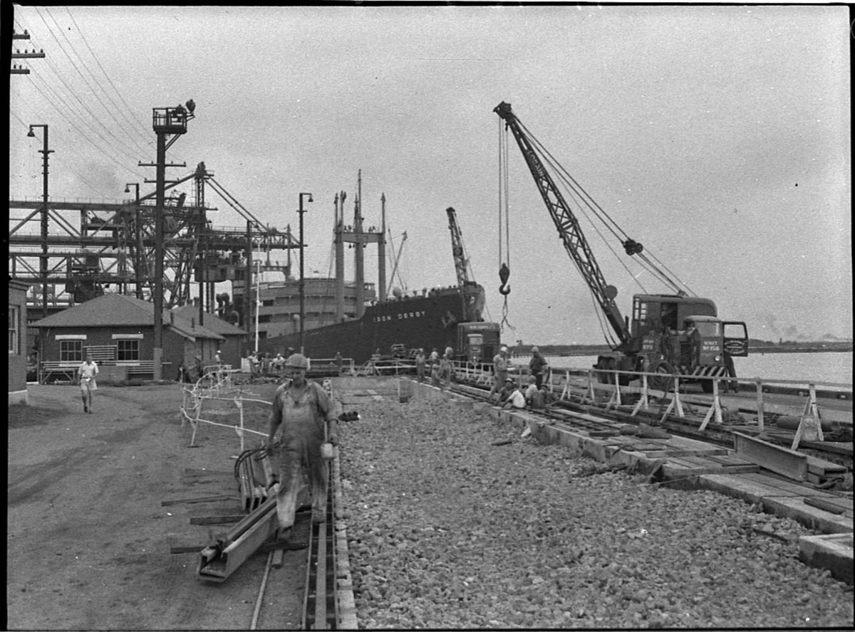 Ships Iron Derby and Baroota loading BHP wharf (1955)