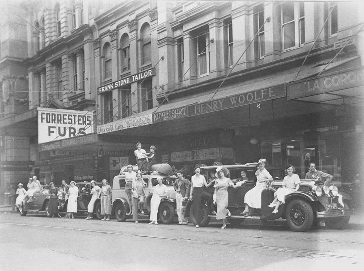 Sixteen theatrical showgirls probably JC Williamsons posing outside Sam Hoods studio at 124 Pitt (1930s)