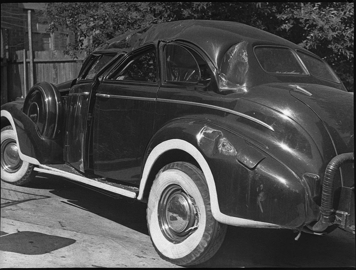 Smashed Hoyts Buick 41 840 1940 Sedan with headlight blackouts and rear charcoal gas producer Stanmore (1943)