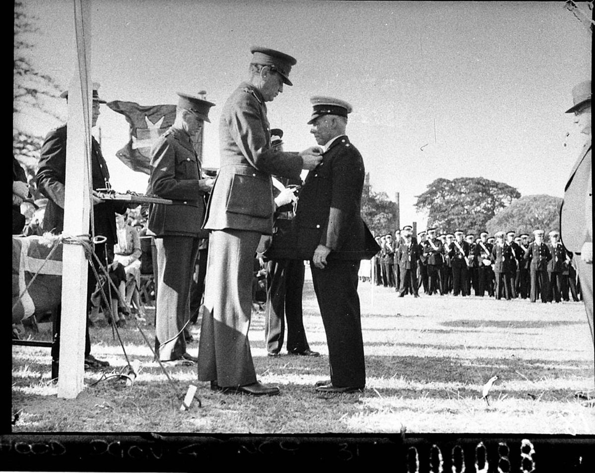 St Johns Ambulance parade The Governor Lord Wakehurst shakes hands with a recipient, Sydney city centre (1940)