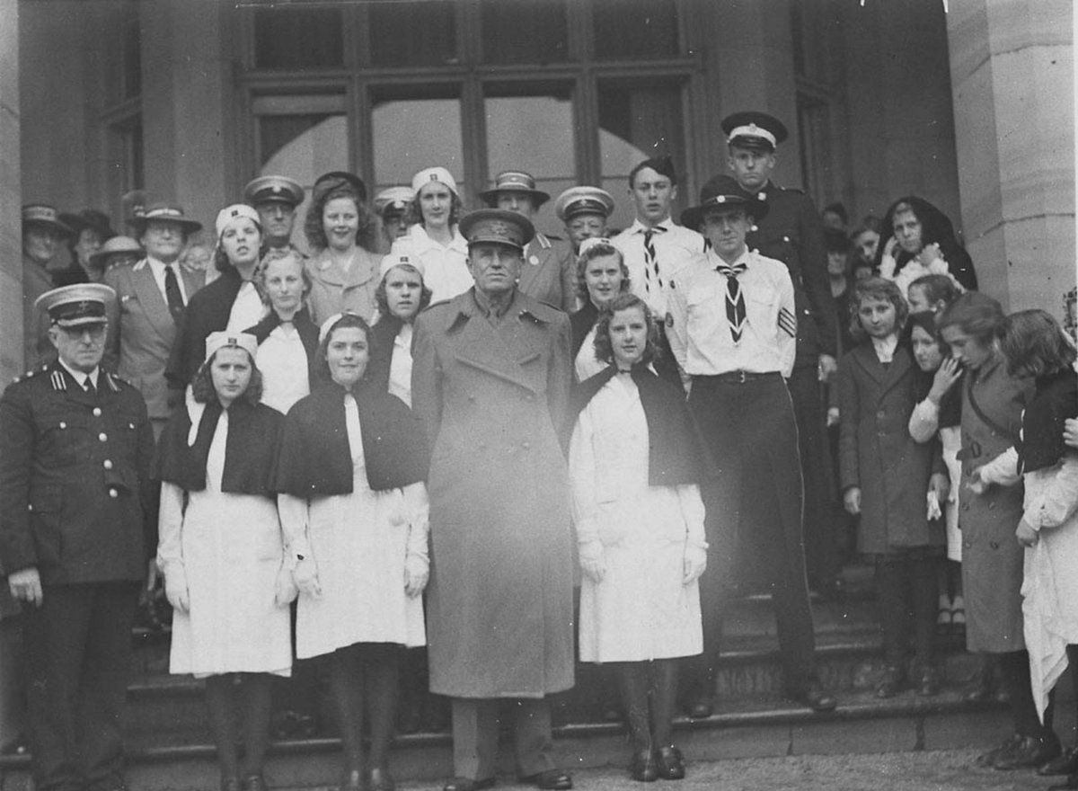 State Governor or Acting reviews St John Ambulance Brigade at Government House, Sydney city centre (1930s)