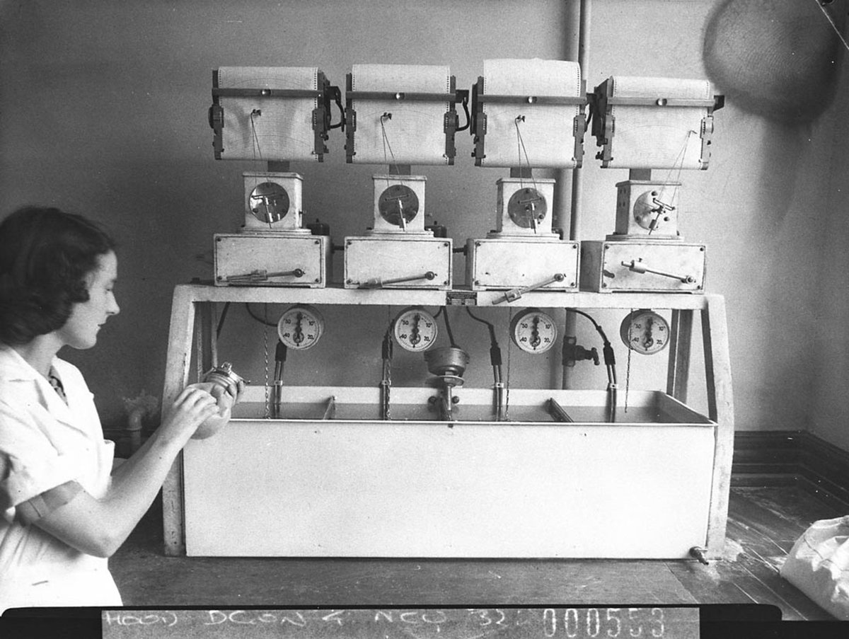 Testing flour and wheat at the Agriculture Department taken for Smiths Weekly, Sydney (1946)