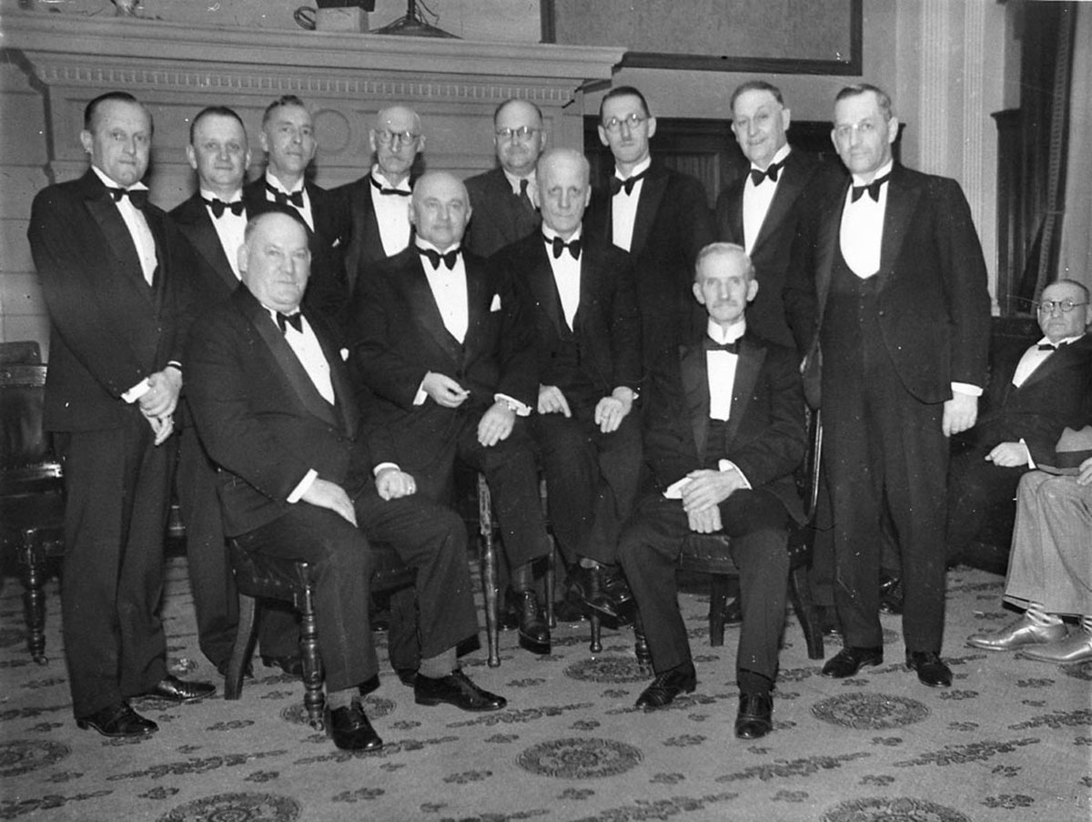 Theatre managers Bill Szarka large man seated left (1930s)