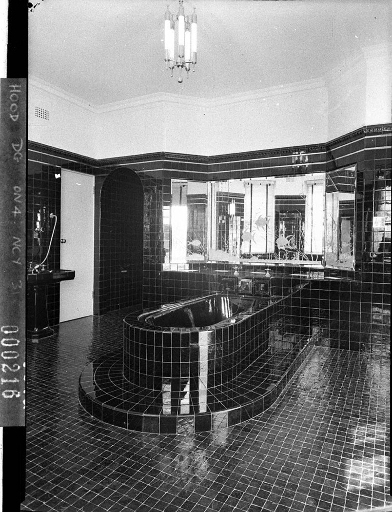 Tiled bathroom with elevated bath Burnham Thorpe Gordon home of Mr Woolcott Forbes (1940)