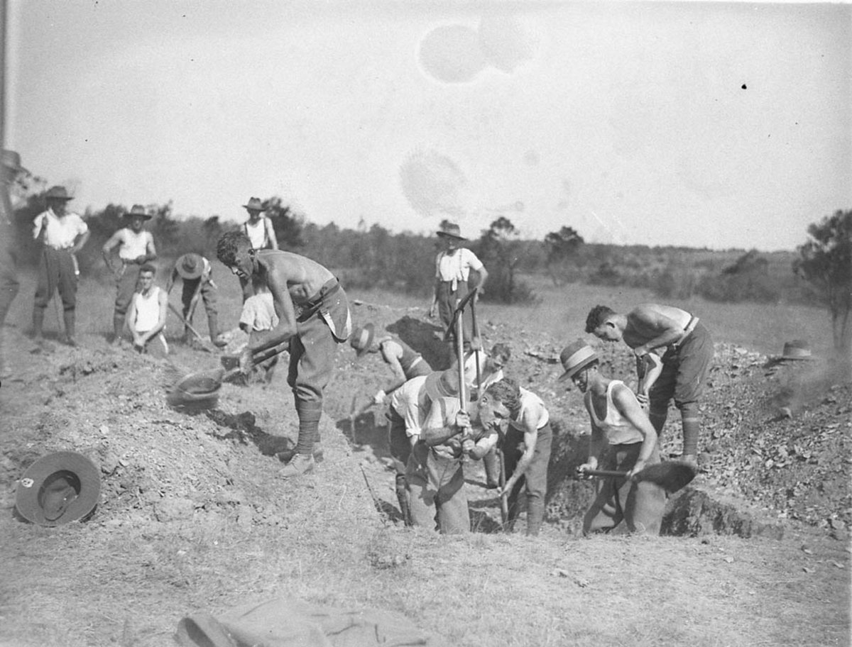 Troops earn their title of Digger as they dig trenches (c. 1932)