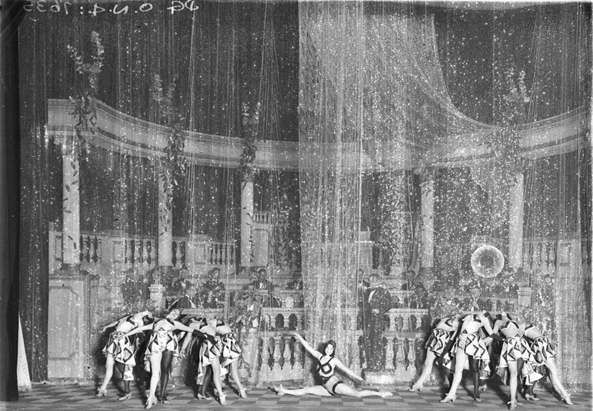 Twelve State Ballet girls and orchestra on stage (1930s)