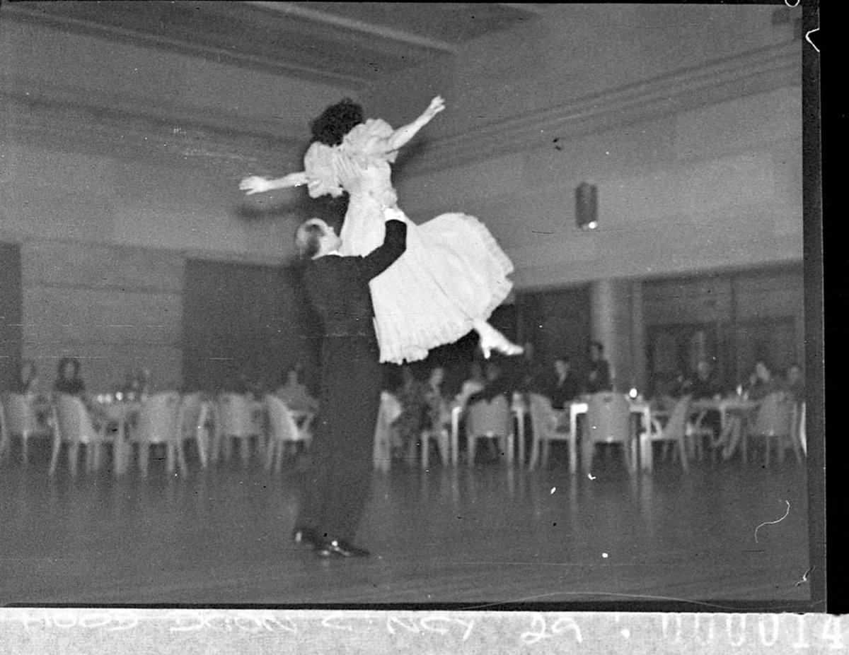 Two rofessional ballroom dancers executing a lift Grace Bros Auditorium, Sydney (1937)