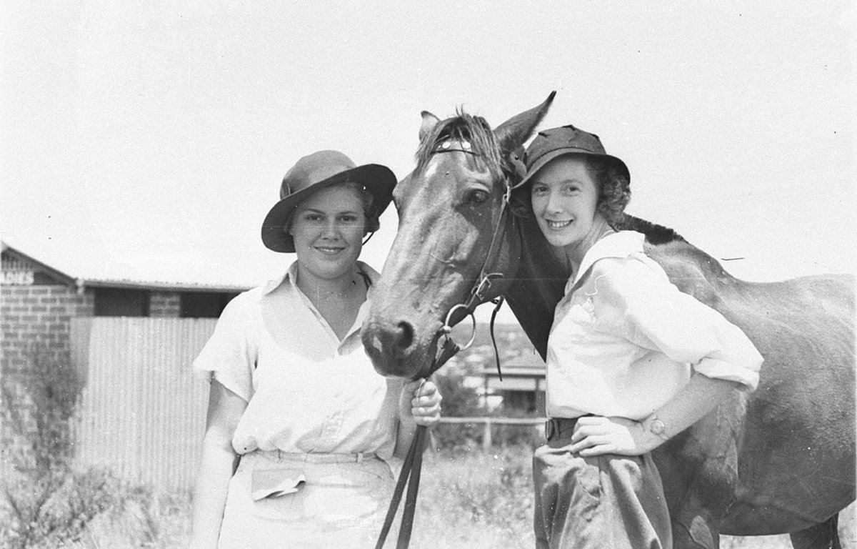 Two young horsewomen with their pony (1920–30)