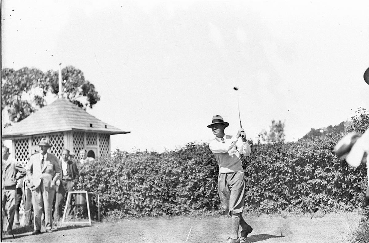 Unidentified golfer driving off (1930s)