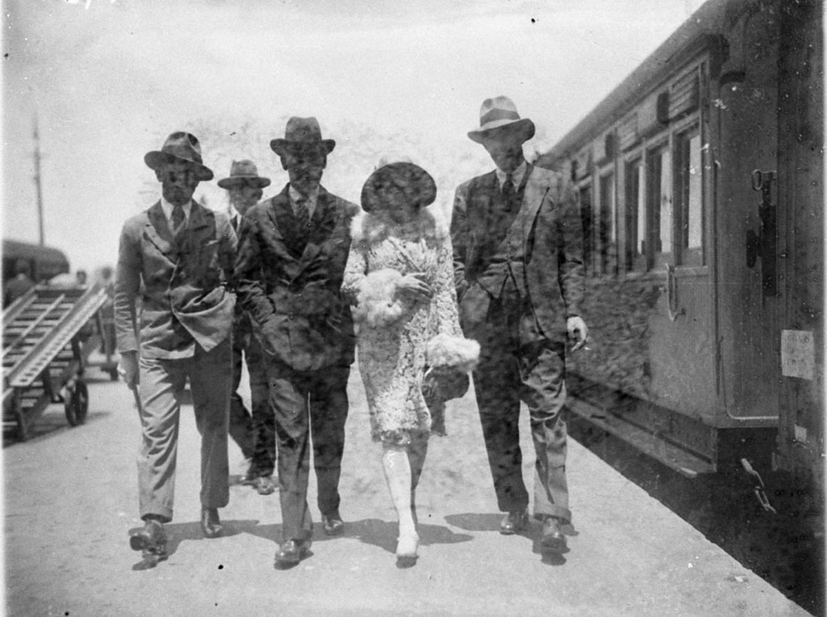Unidentified group of theatricals arrive at Central Station from Melbourne, Haymarket (1927–30)