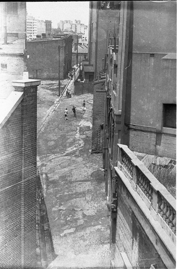 Unidentified lane in city of Sydney probably The Rocks with stairs related to Harbour Bridge construction (1930s)