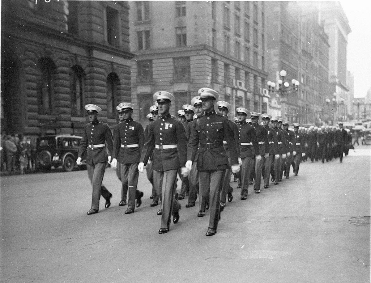 US Marines marching ahead of the sailors (c. 1930)