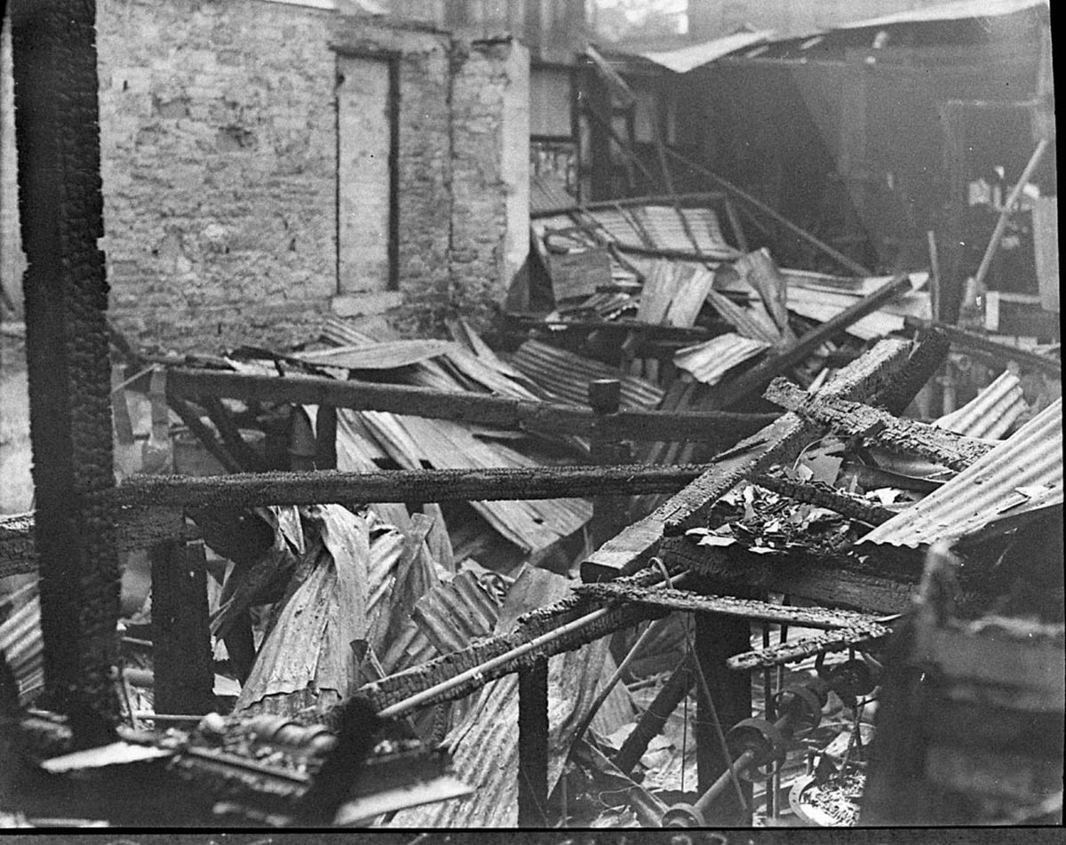 View of charred interior Pacific Manufacturing Co fire (1935)
