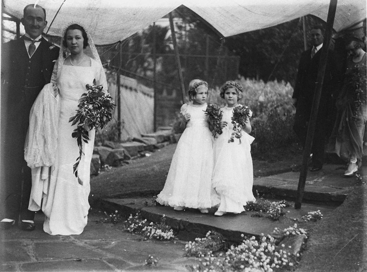 WhitneyFriend bridal couple and two flower girls arrive at reception Wirian (1934)