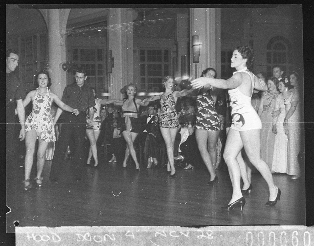 Women in swimsuits dance at McRae Knitting Mills Ball at Wentworth Hotel, Sydney city centre (1937)