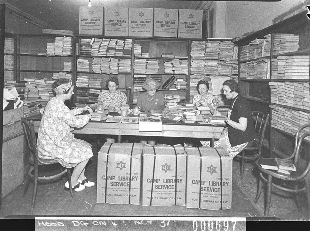 Women volunteers packing Camp Library Service boxes for servicemen taken for Australian Comforts Fund, Parramatta (1944)