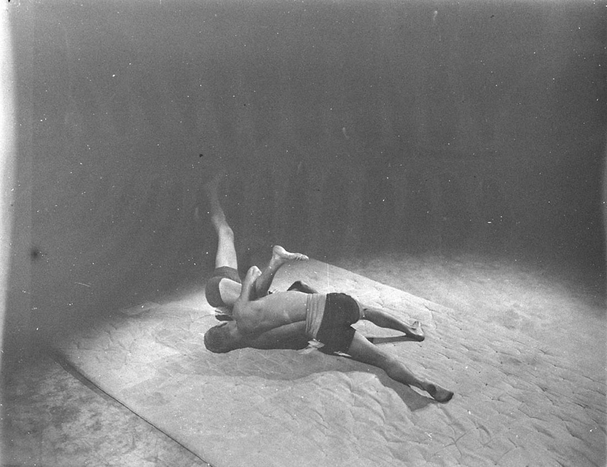 Wrestlers working out in the gymnasium (1930s)