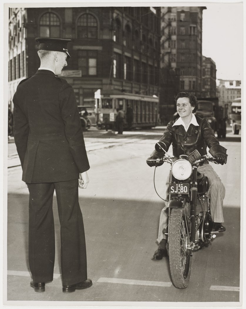 Female motor cyclist, Railway Square, Sydney, n.d., by Ted Hood (1913–57)