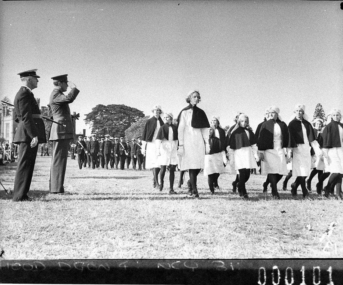 St John's Ambulance parade. The Governor takes the salute from the Red Cross girls, 19 October 1940, by Sam Hood, Sydney