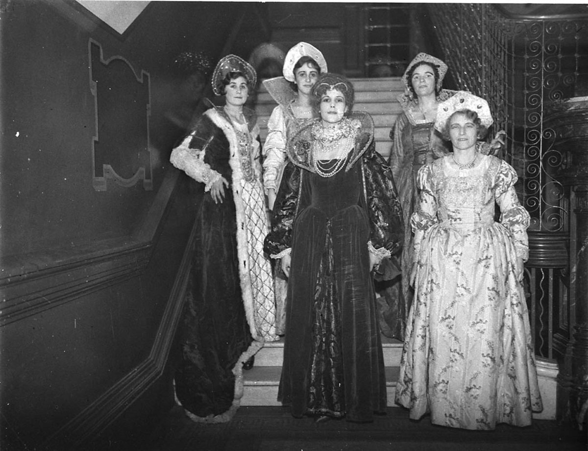 Group of five women in Elizabethan costumes (ball or eisteddfod), Sydney Town Hall, 193- - photographer Sam Hood, Sydney city centre (1934)