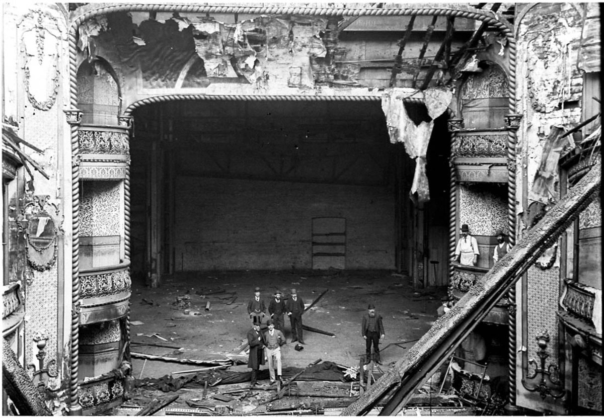 Architect Humphreys, father of Dr E.M. Humphreys, surveys the fire damage to the Theatre Royal during Mrs. Bernard Beere's season ?, Sydney, 1892 - photographer Albert James Perier, Sydney city centre