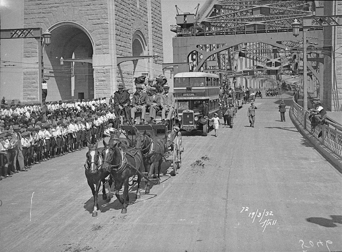 Stage coach and double-decker bus in procession, Sydney Harbour Bridge Celebrations, 1932 - photographer Hall and Co