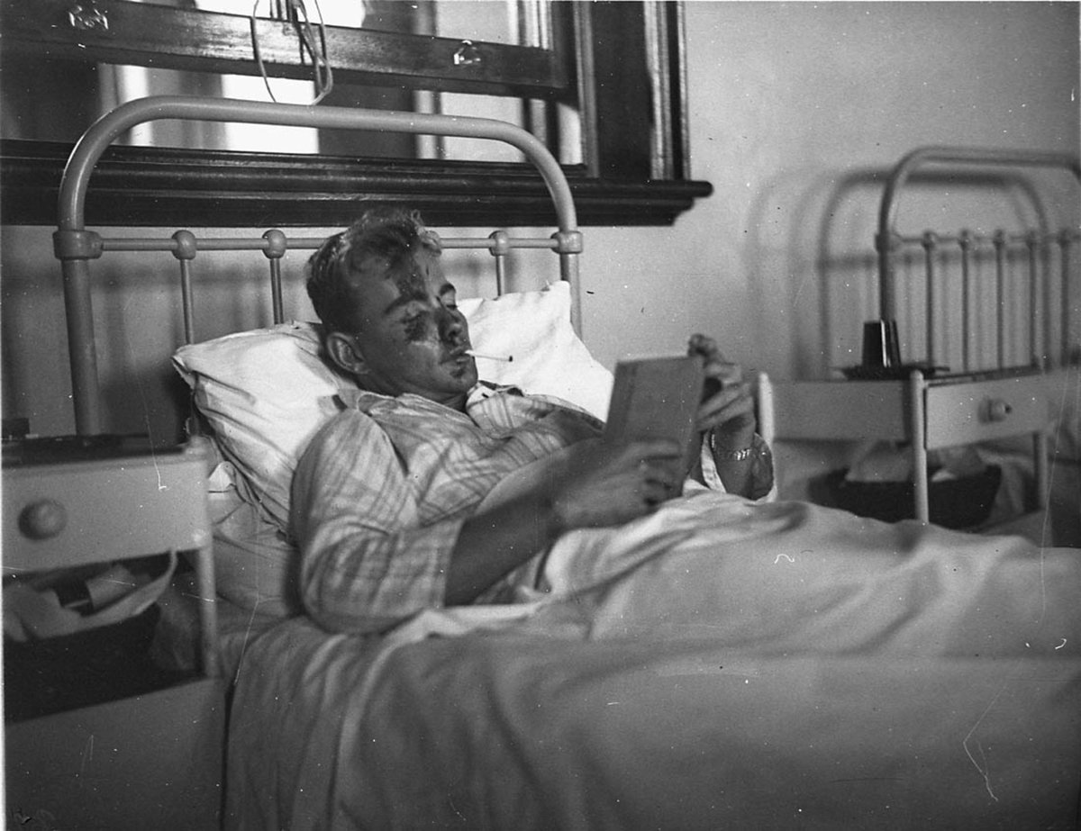 Speedway driver Harry Lewis recovers from a crash, St. Vincent's Hospital, by Sam Hood, Feb 1935, Sydney