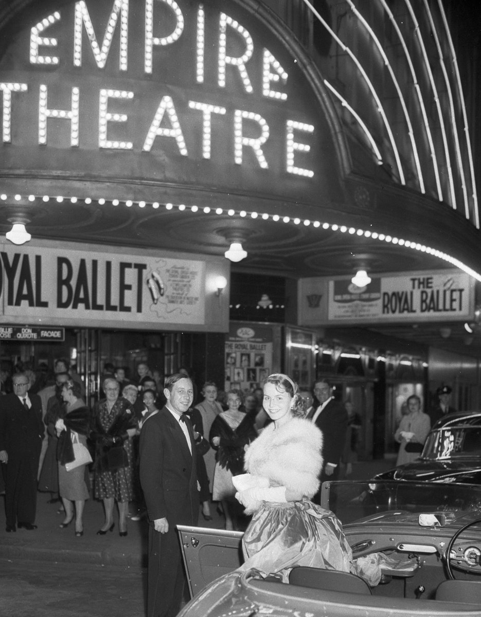 Waratah Spring Festival Princess 1958 arrives in an open car for the Royal Ballet at the Empire Theatre, Sydney, 1 September 1958 - photographer Ken Redshaw, Australian Photographic Agency