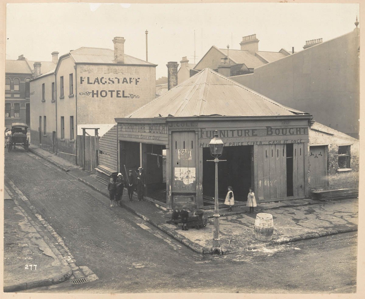 Corner of Cumberland and Little Essex-streets from Views taken during Cleansing Operations, Quarantine Area, Sydney, 1900, Vol. V - under the supervision of Mr George McCredie, F.I.A., N.S.W, Martin Place