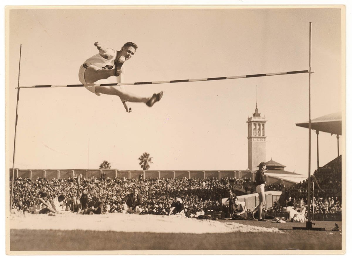 High jumper Metcalfe, Empire Games in Sydney for Sesquicentenary, 1938, by Sam Hood
