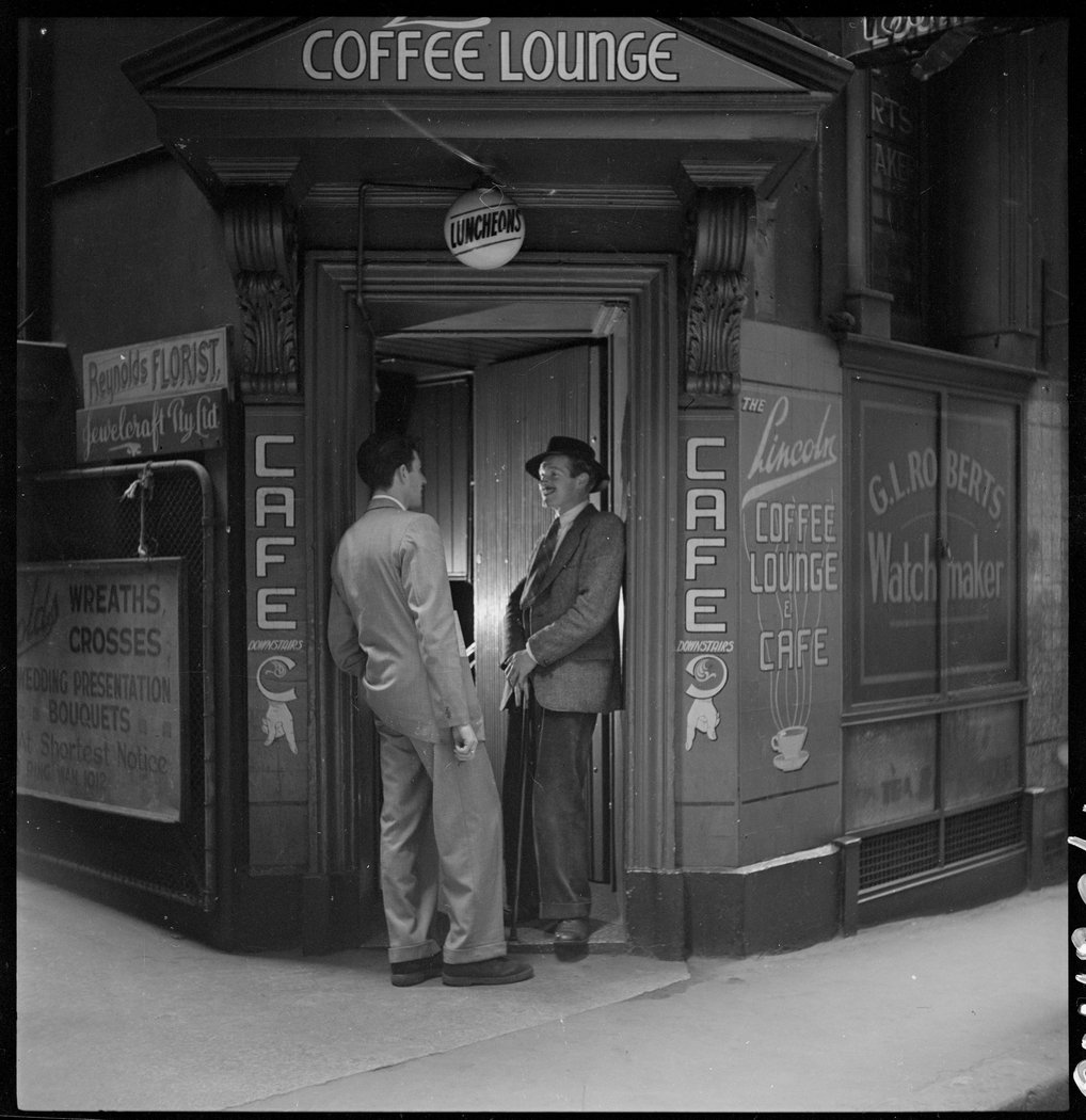 Dick Gooding (on right of door) from Lincoln Coffee Lounge and Cafe, Rowe Street, Sydney - photographed by Brian Bird c. 1948-1951 (1948–51)