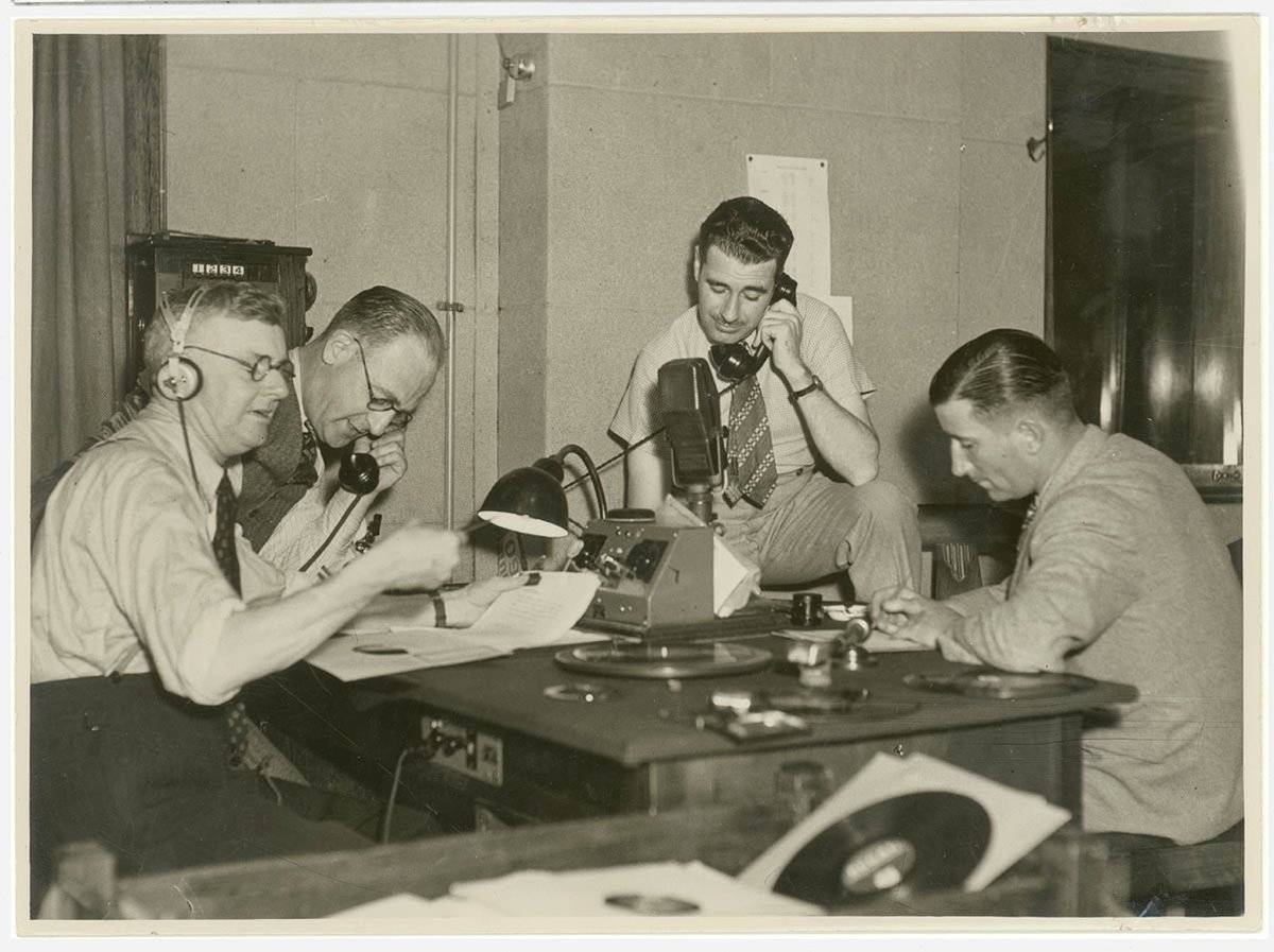 Group of radio producers in a studio, c. 1930s, by Sam Hood