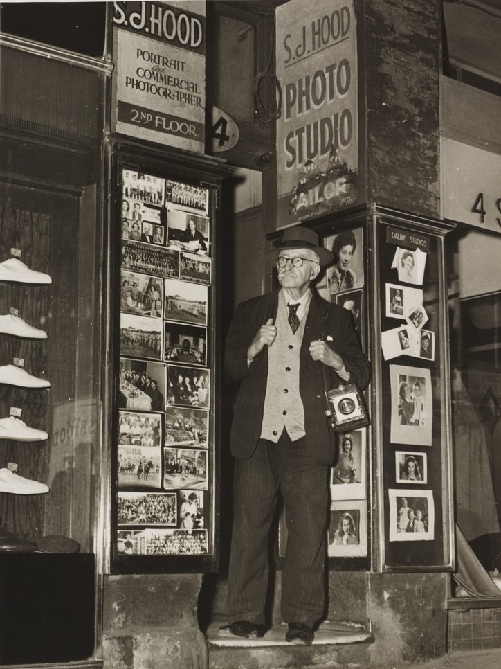 Sam Hood outside his Dalny Studios, 124 Pitt Street, Sydney, 1953 - photographer Ted Hood, Sydney city centre