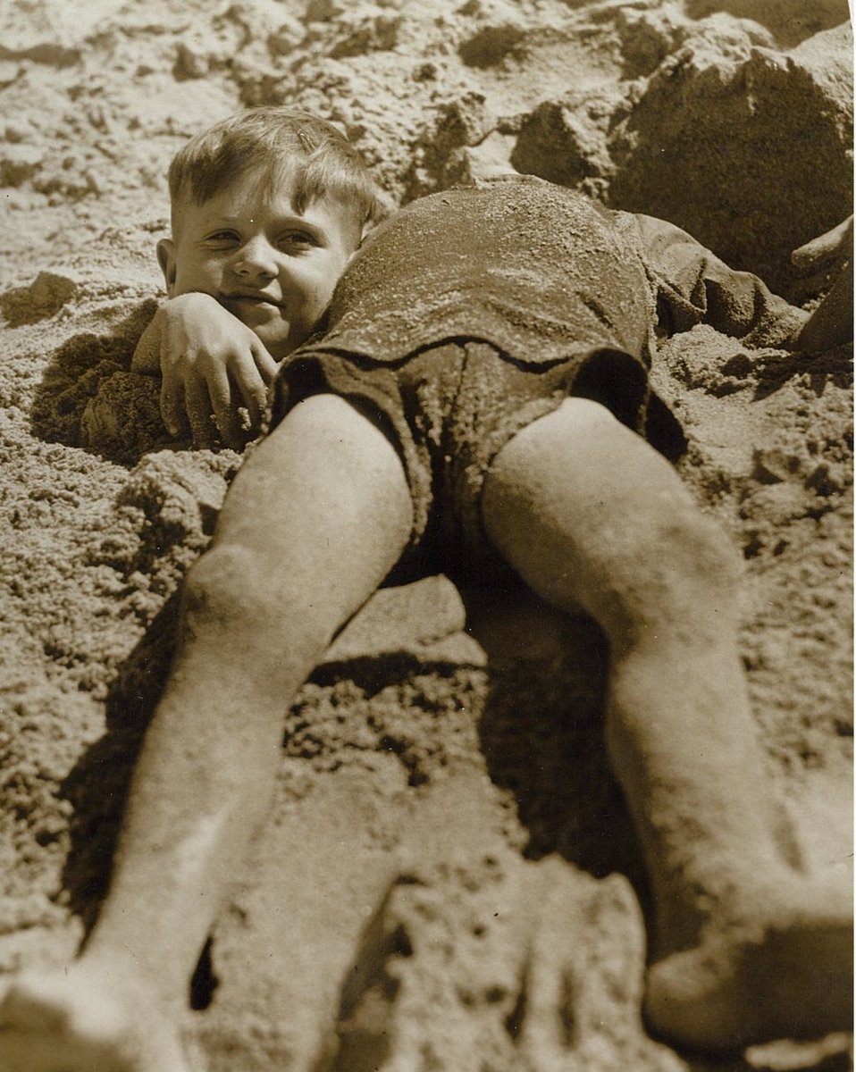 Billy and Graham Green from the Salvation Army Camp practise a little deceit, Collaroy Beach, ca. 1940 - photographer unknown (c. 1940)