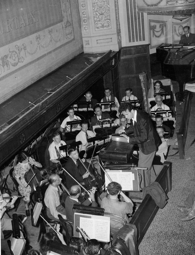 Antal Dorati conducts an orchestral rehearsal for Colonel de Basil's "Original Ballet Russe" (Russian Ballet) season, Theatre Royal, Sydney, December 1939 - Sam Hood, Sydney city centre