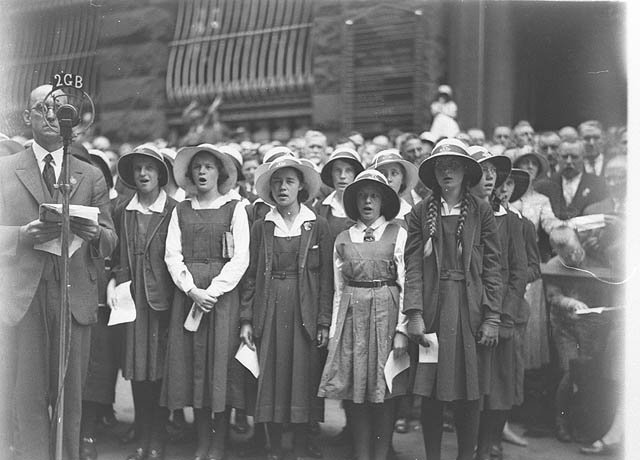 Uniformed Sydney Girl's High School girls singing near 2GB microphone, 1930s - Sam Hood, Martin Place