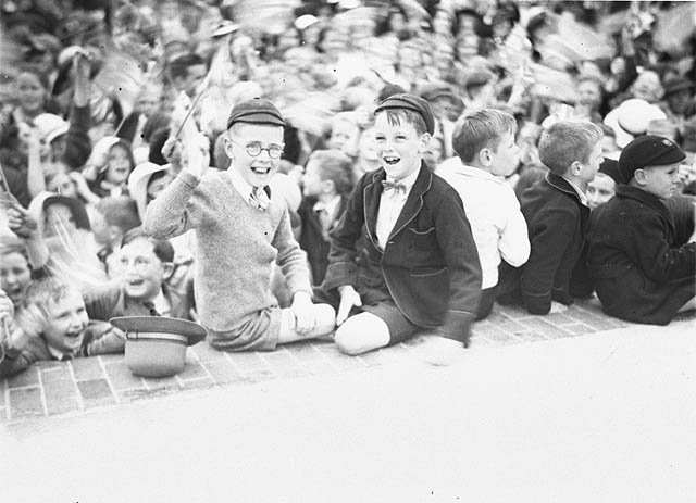 Two young schoolboys wave their flags, 1934 - Sam Hood