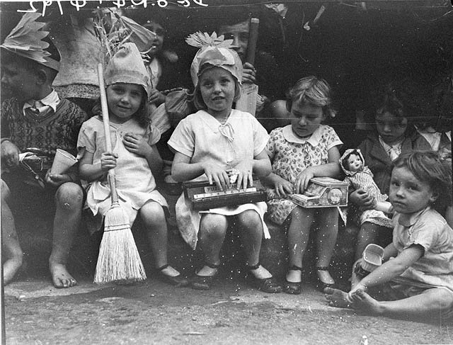 Kids with their presents, ca. 1934 - by Sam Hood (c. 1934)