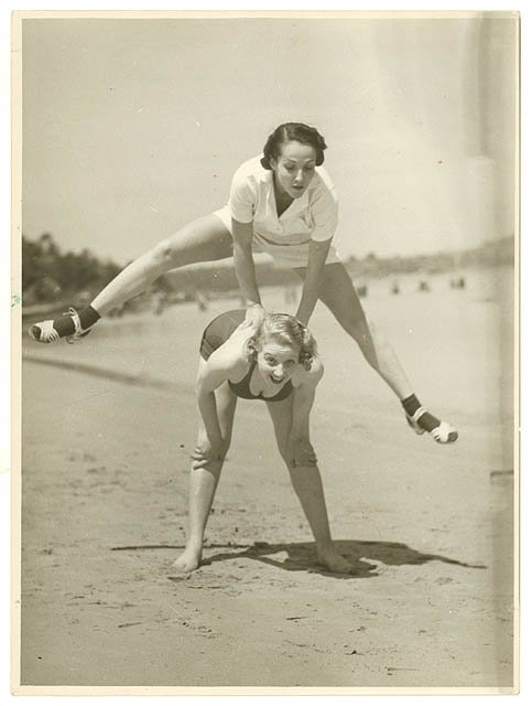Valerie Hays from the cast of "Over she goes" being leapfrogged, 1937 - by Sam Hood, Bondi