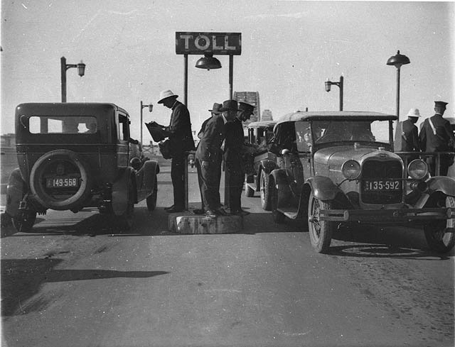 Opening of the Sydney Harbour Bridge; the first cars at the toll bar, 1932
