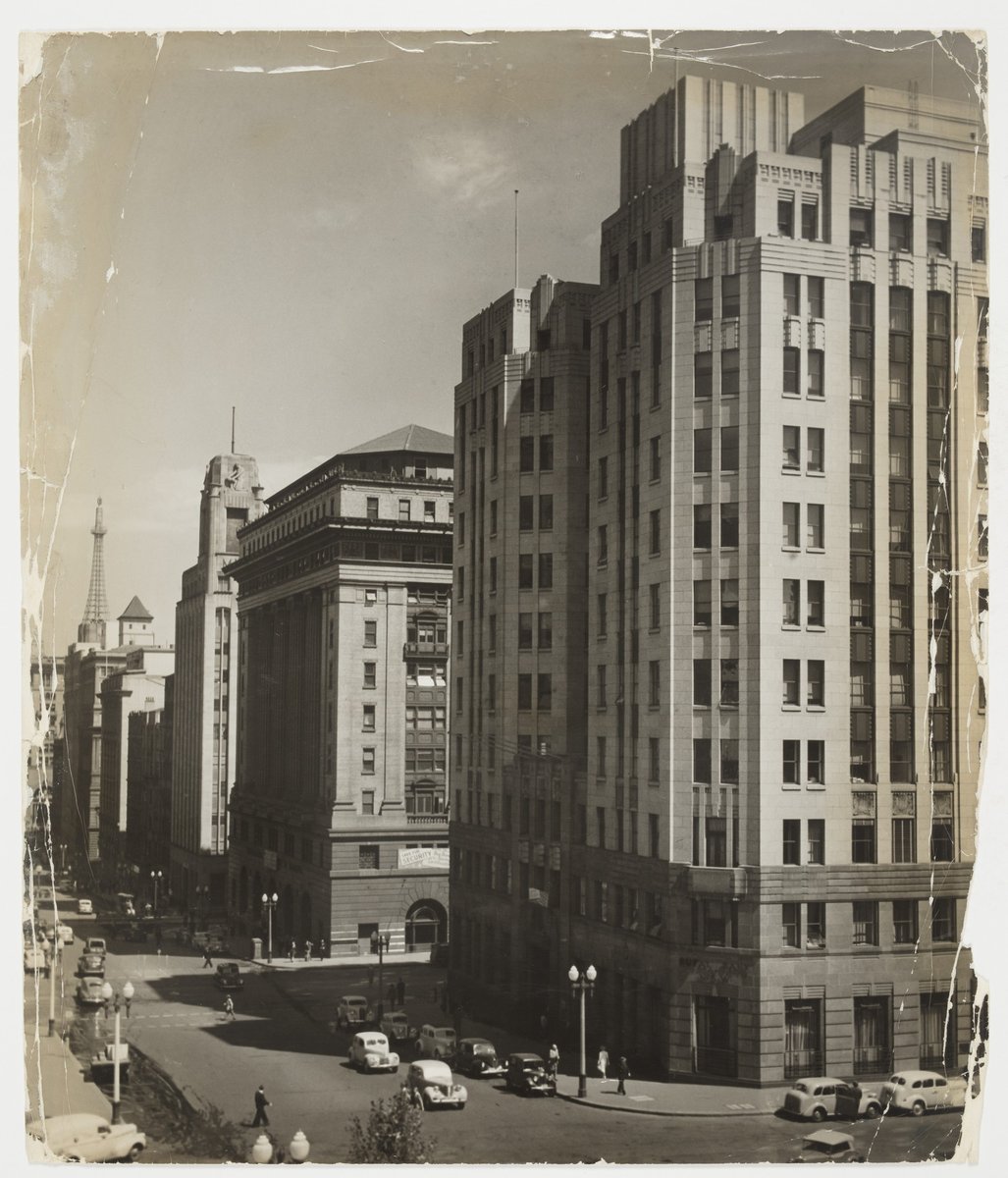 SLNSW - View of the northern side of Martin Place Sydney, showing the Rural Bank Building, State Savings Bank Building, MLC Building, and AWA Tower in the background, published in Walkabout Magazine (1 August 1950)