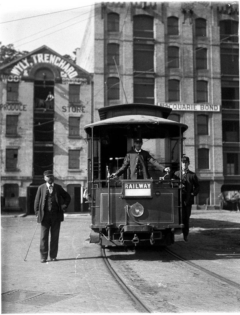 "Railway" (Central Station) tram, Wyly. Trenchard Produce Store and Macquarie Bond Store, Circular Quay, c.1898 - by Albert James Perier, Haymarket (c. 1898)