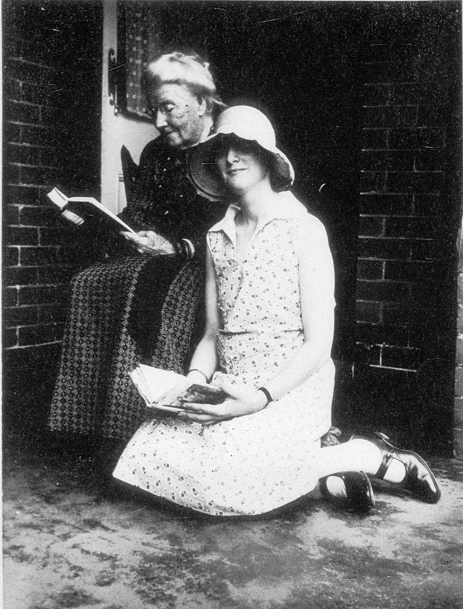 Women reading on the veranda of their home in Cremorne - Sydney, NSW, Photographed by - Ella Hammond. Hannah Hammond and granddaughter Barbara Hammond, c. 1920s